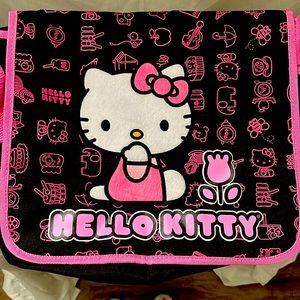 Hello kitty’s Sanrio school bag can be for kids. Strapped on shoulder bag.